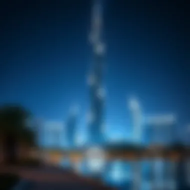Arenco Tower illuminated at night, highlighting its prominence in the Dubai skyline