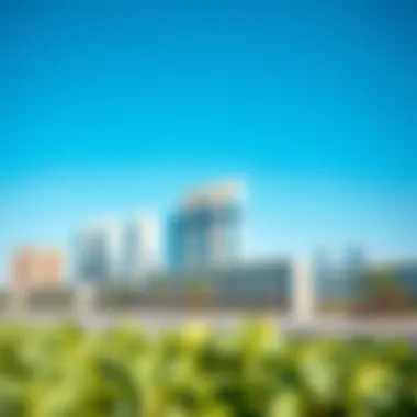 Modern architecture and skyline of Dubai Land under a clear blue sky