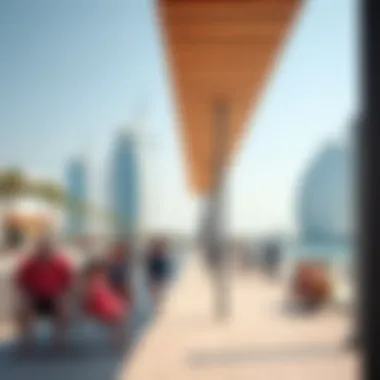 People enjoying leisure activities along the Yas Bay promenade, highlighting community engagement.