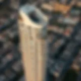 Aerial view of Tamouh Tower showcasing its unique architectural design