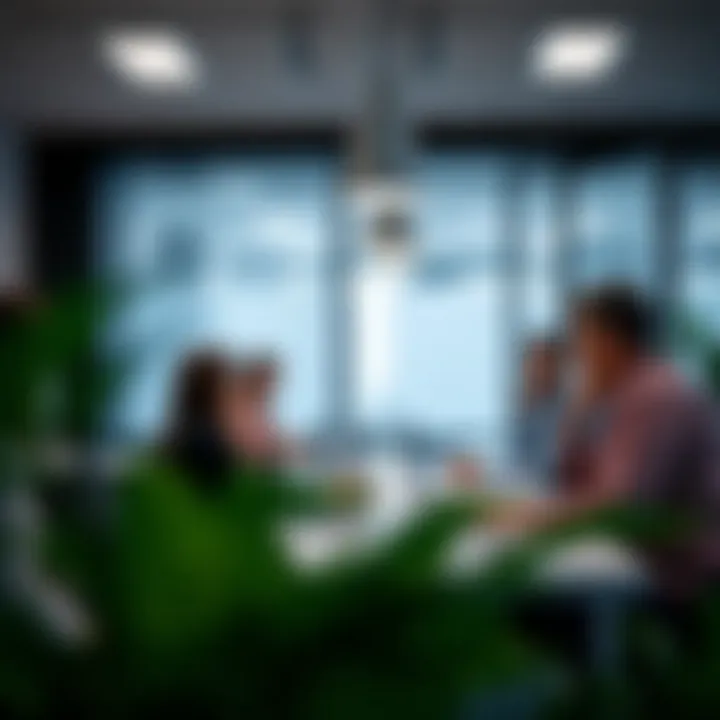 Business professionals engaging in collaborative work in a Tecom office environment.