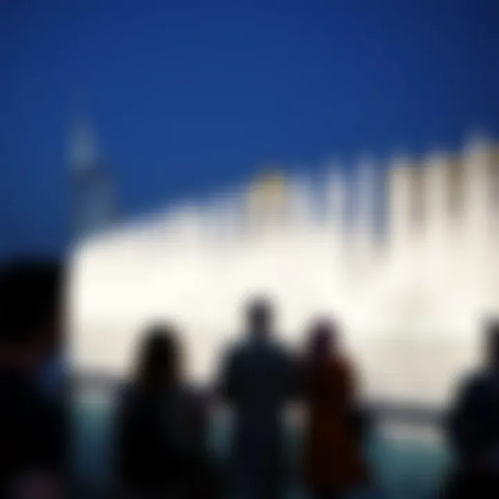 Visitors enjoying the spectacle of The Pointe Dubai Fountain